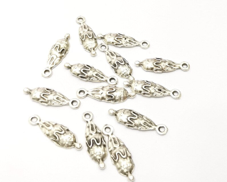 10 Silver Charms Antique Silver Plated Charms (21x7mm) G17680