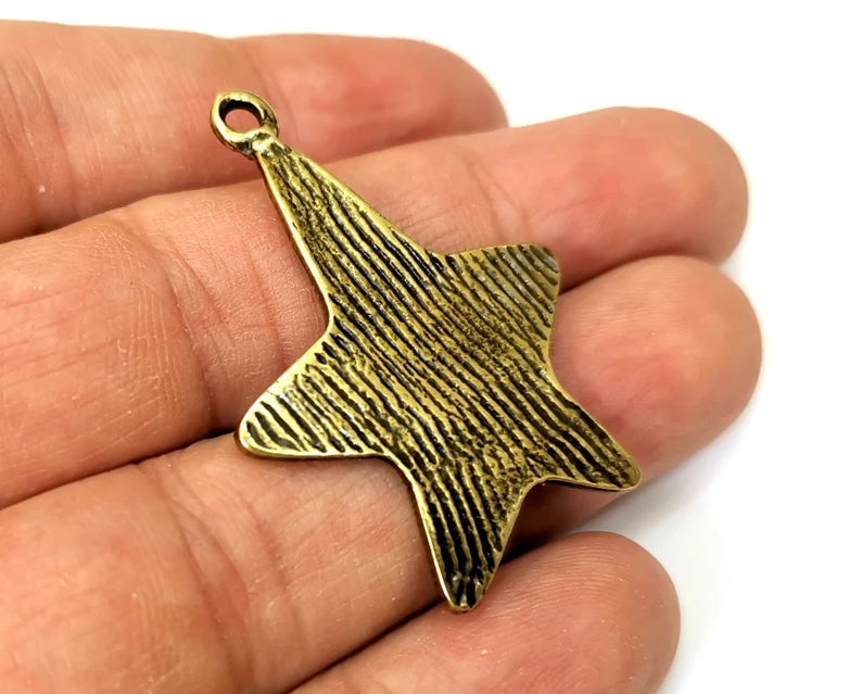 Star Charms, Antique Bronze Plated (43x31mm) G33555