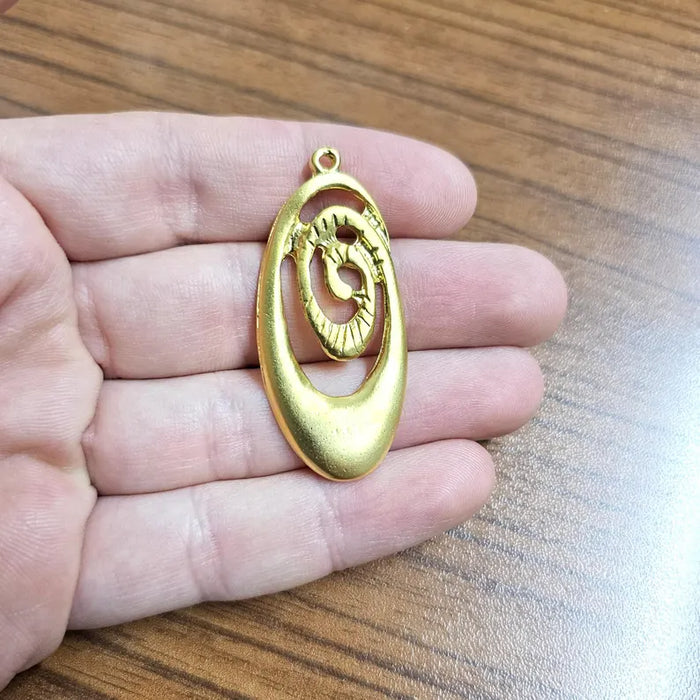 Oval swirl Gold plated charms (51x23mm) G36568