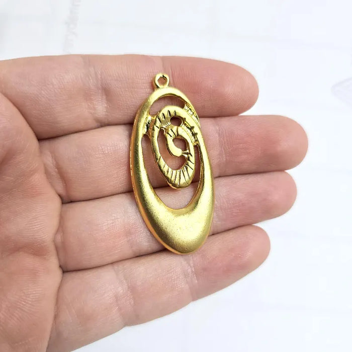 Oval swirl Gold plated charms (51x23mm) G36568