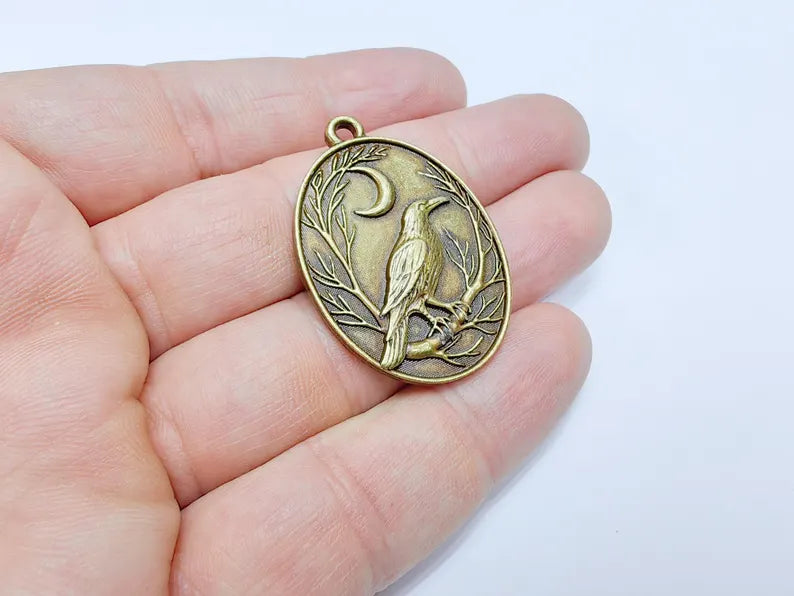 Raven and Moon Charm Pendant, Gothic Boho Charm, Nature Earring Charm, Mystical Bird, Necklace Parts, Antique Bronze Plated 40x28mm G36716