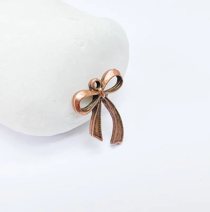 2 Bow Charm, Bow Tie Pendant, Ribbon Charms, Earring Charms, Dangle Pendant, Antique Copper Plated 21x18mm G36777