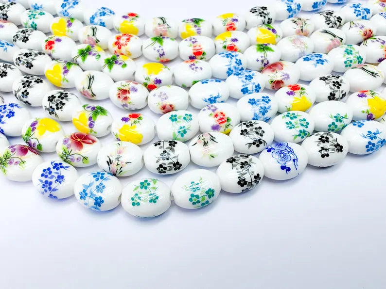 22 Floral Oval Porcelain Ceramic Bead Strand, 22 Pcs Full Strand, White Beads with Colorful Flower Print, 14x11mm Glossy Jewelry Bead G37021