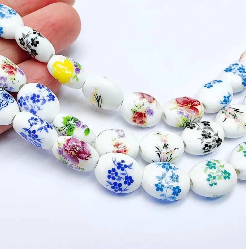 22 Floral Oval Porcelain Ceramic Bead Strand, 22 Pcs Full Strand, White Beads with Colorful Flower Print, 14x11mm Glossy Jewelry Bead G37021