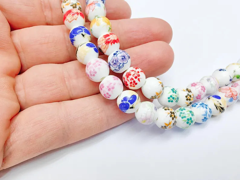 35 Floral Round Porcelain Ceramic Bead Strand, 35 Pcs Full Strand, White Beads with Colorful Flower Print, 10mm Glossy Jewelry Bead G37055