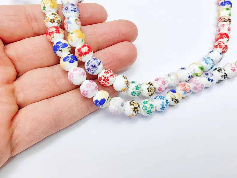 35 Floral Round Porcelain Ceramic Bead Strand, 35 Pcs Full Strand, White Beads with Colorful Flower Print, 10mm Glossy Jewelry Bead G37055
