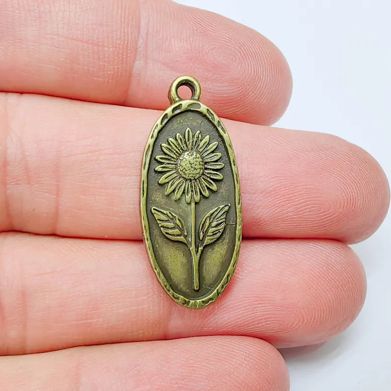 Sunflower Pendant Charm, Oval Floral Pendant, Antique Bronze Plated Jewelry Making, 30x13mm G37560