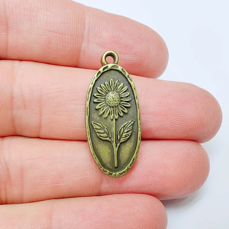 Sunflower Pendant Charm, Oval Floral Pendant, Antique Bronze Plated Jewelry Making, 30x13mm G37560