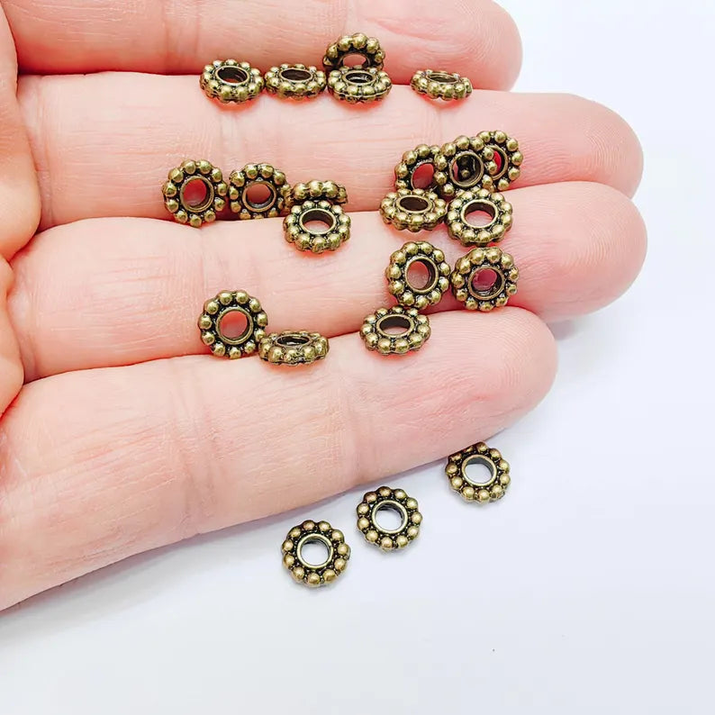 10 Rondelle Spacer Beads, Textured Daisy Wheel Design, 7mm, Antique Bronze Plated, G38005