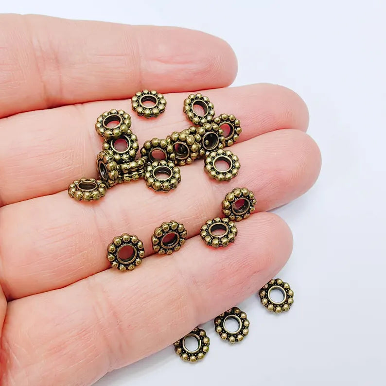 10 Rondelle Spacer Beads, Textured Daisy Wheel Design, 7mm, Antique Bronze Plated, G38005