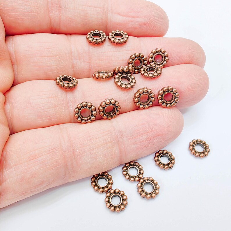 10 Rondelle Spacer Beads, Textured Daisy Wheel Design, 7mm, Antique Copper Plated, G37993