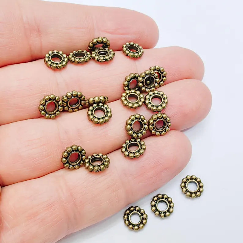 10 Rondelle Spacer Beads, Textured Daisy Wheel Design, 7mm, Antique Bronze Plated, G38005