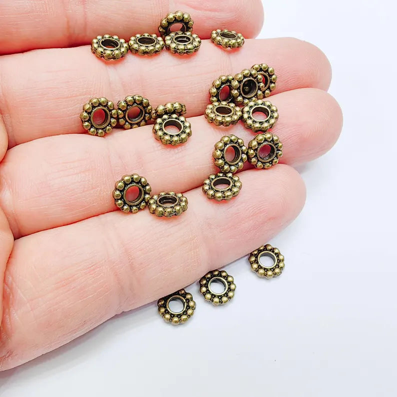10 Rondelle Spacer Beads, Textured Daisy Wheel Design, 7mm, Antique Bronze Plated, G38005