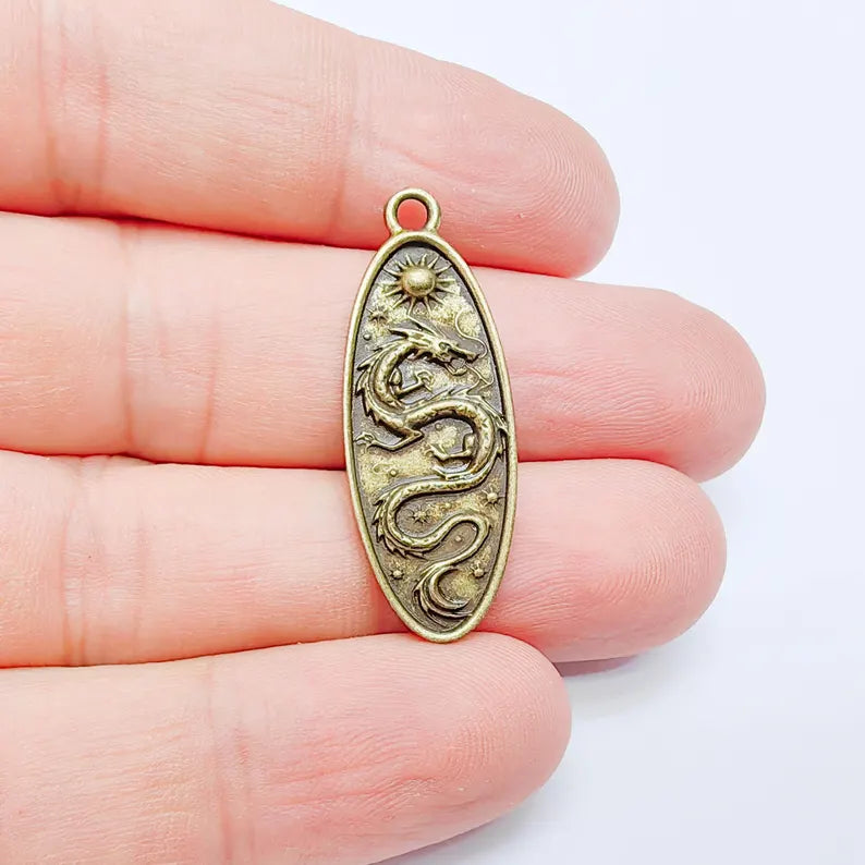 Dragon Oval Charm Pendant, Double Sided Mythical Design, Antique Bronze Plated, 36x13mm, G38123 Bilal