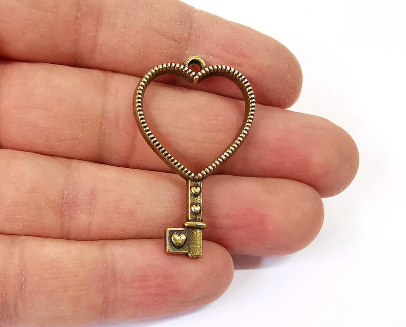 4 Heart key charms Antique bronze plated charms (41x25mm) G24159