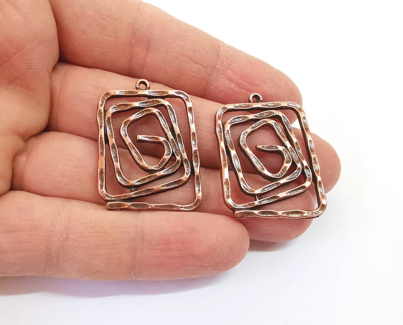 2 Spiral charms Antique copper plated charms (34x26mm) G24195