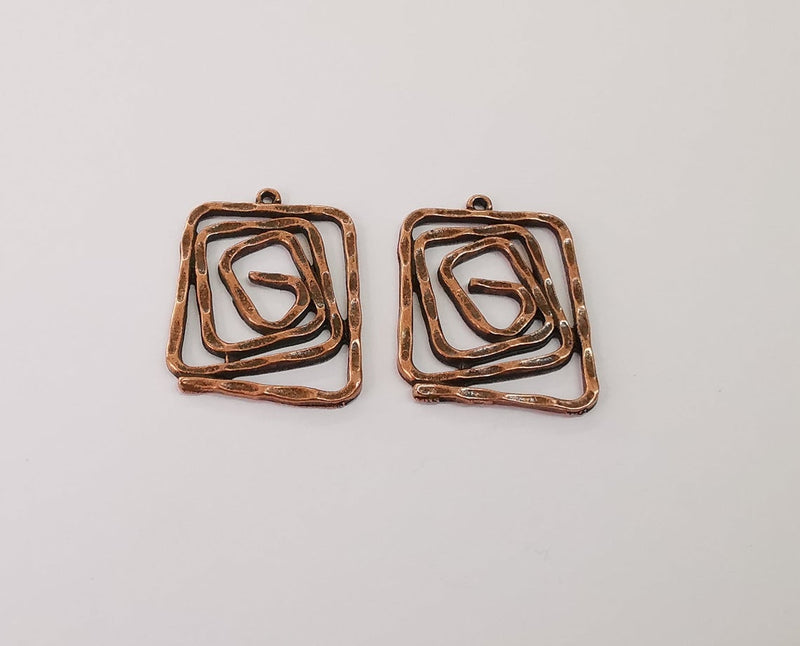 2 Spiral charms Antique copper plated charms (34x26mm) G24195