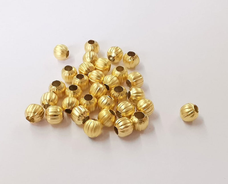 10 Ribbed round beads Gold plated beads (6mm) G24392