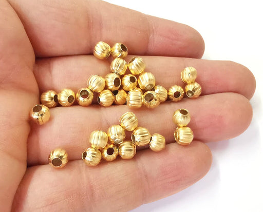 10 Ribbed round beads Gold plated beads (6mm) G24392