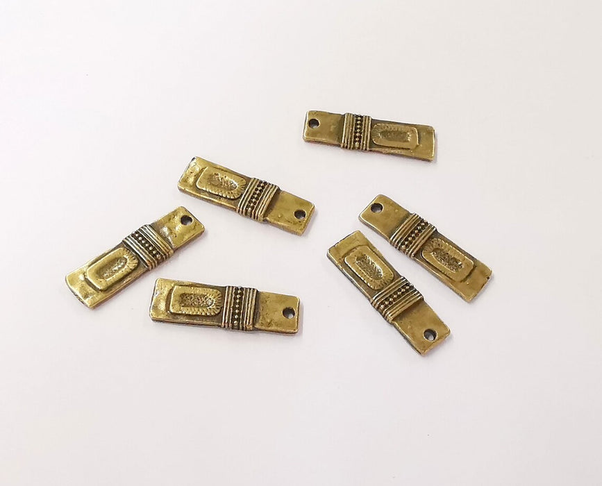 10 Antique bronze charms Antique bronze plated charms (23x7mm) G24393