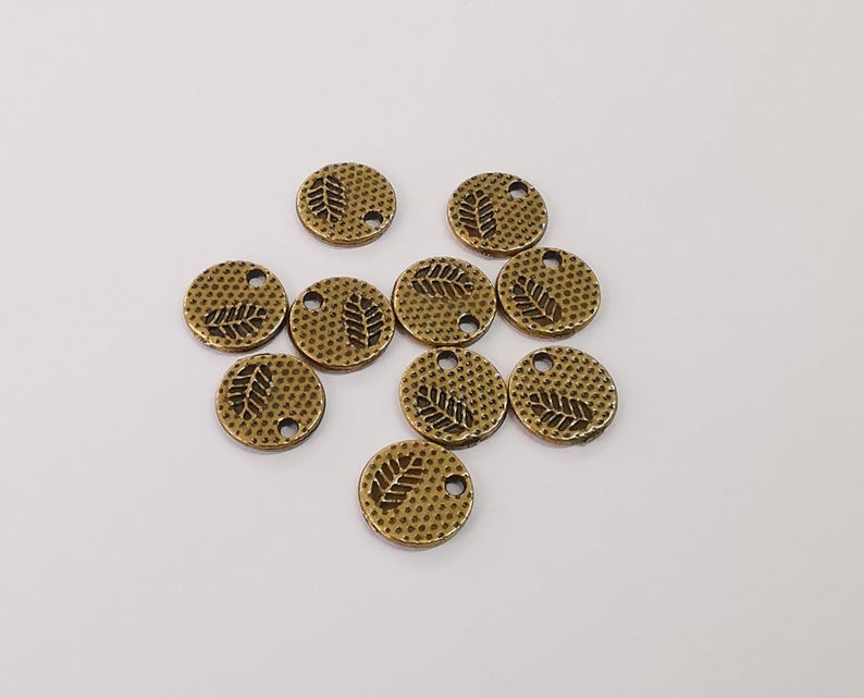 10 Leaf charms Round charms (Double Sided) Antique bronze plated charms (11mm) G24193