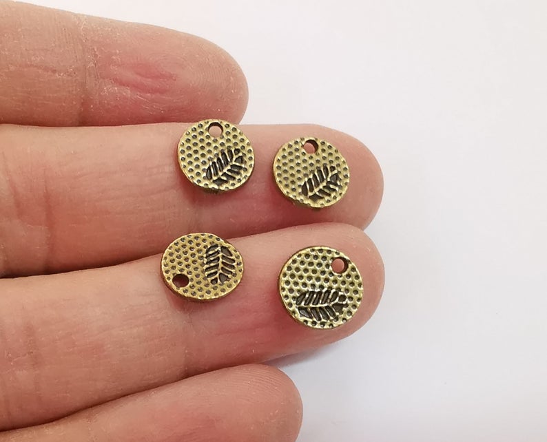 10 Leaf charms Round charms (Double Sided) Antique bronze plated charms (11mm) G24193