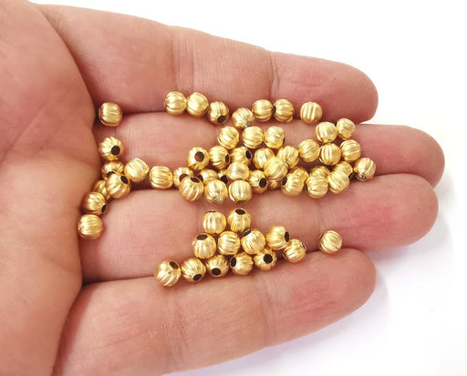 20 Ribbed beads Gold plated beads (5mm) G24245