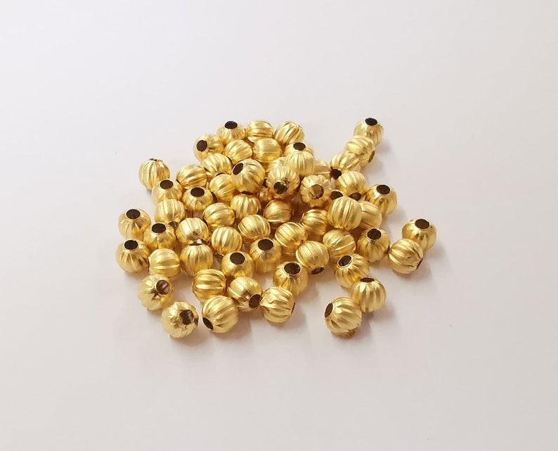 20 Ribbed beads Gold plated beads (5mm) G24245