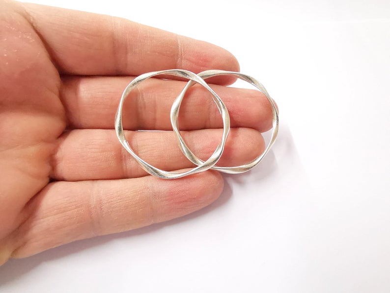 4 Silver circle findings Antique silver plated circle findings (42x38mm) G24300