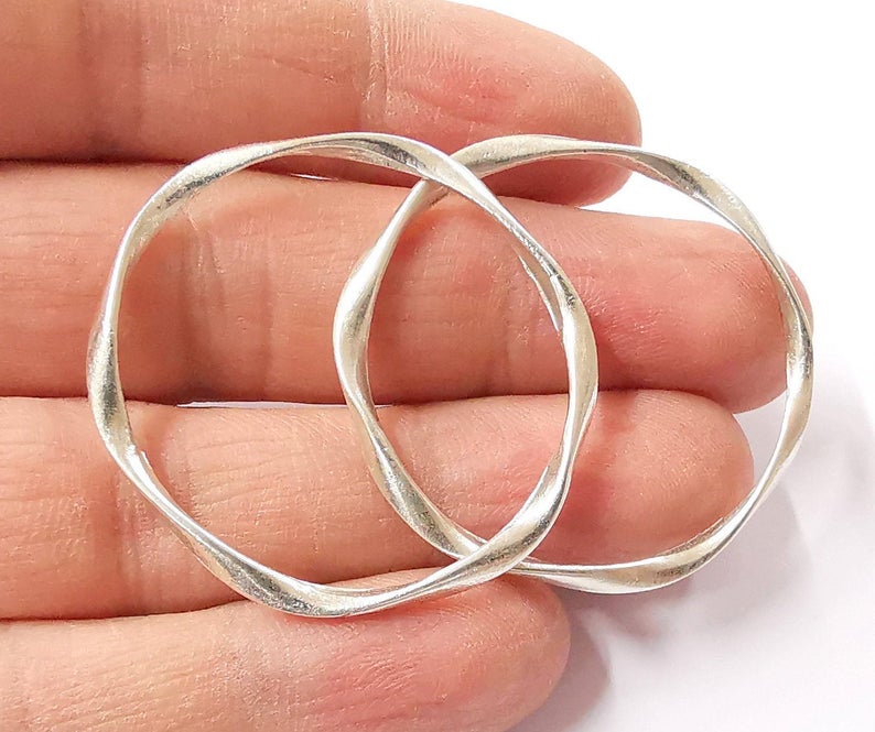 4 Silver circle findings Antique silver plated circle findings (42x38mm) G24300