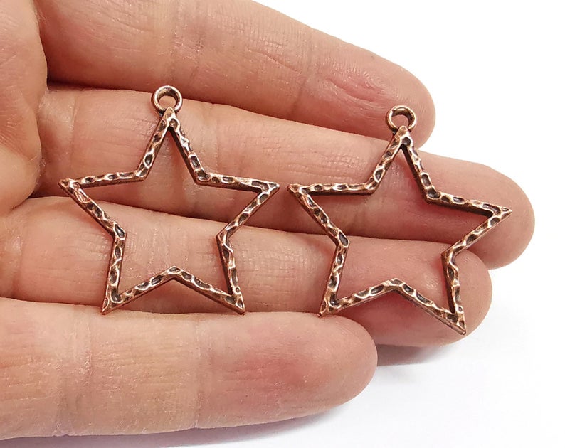 4 Star charms Antique copper plated charms (36x34mm) G24330