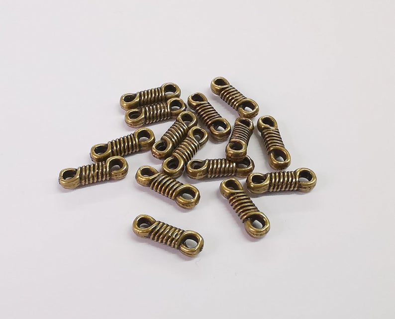 10 Coil knot charms connector Antique bronze plated charms (14x4mm) G24210