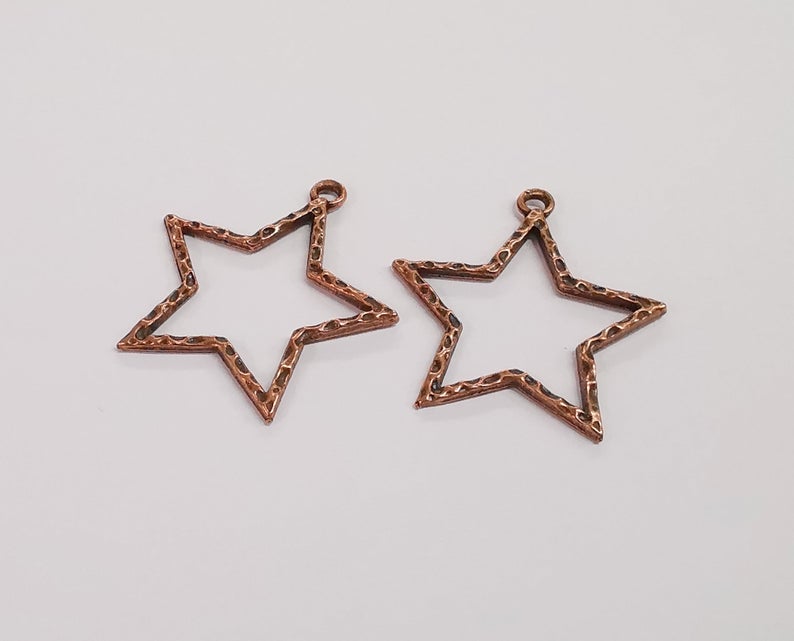 4 Star charms Antique copper plated charms (36x34mm) G24330