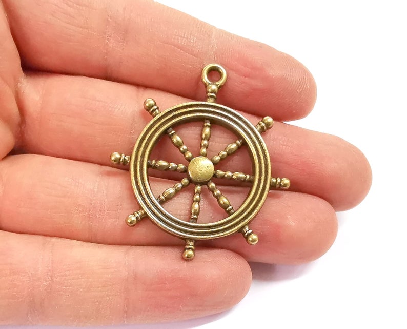 2 Ship wheel charms Antique bronze plated charm (45x37mm) G24351