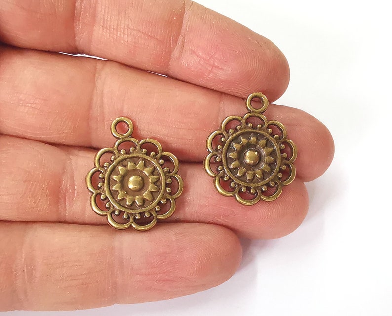 10 Sun charms Antique bronze plated charms (25x20mm) G24867