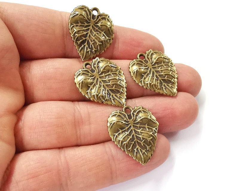 4 Leaf charms Antique bronze plated charms (25x21mm) G24553