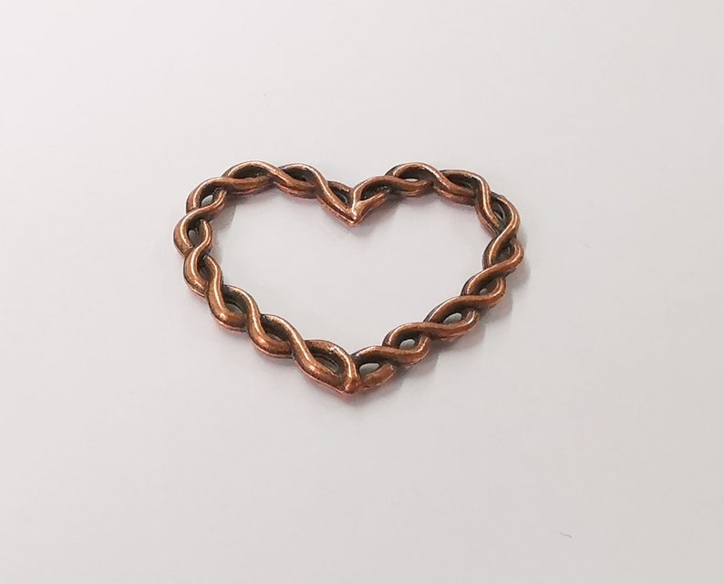 4 Twisted wire shape heart charms Antique copper plated charms (33x27mm) G24557