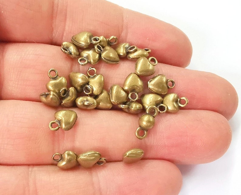 20 Heart charms Antique bronze plated charms (9x7mm) G24558