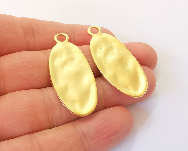 2 Hammered oval charms Gold plated charms (43x19mm) G24567