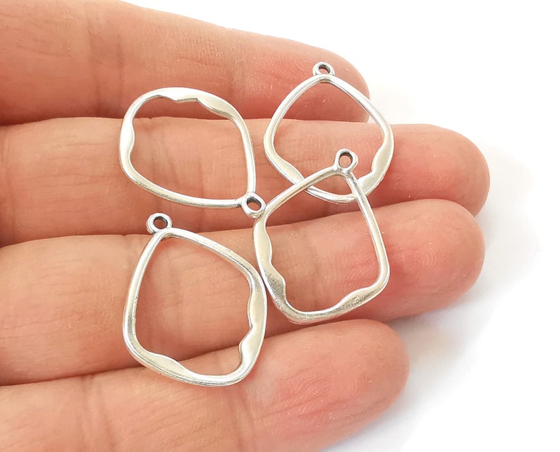 10 Silver charms Antique silver plated charms (27x21mm) G24605