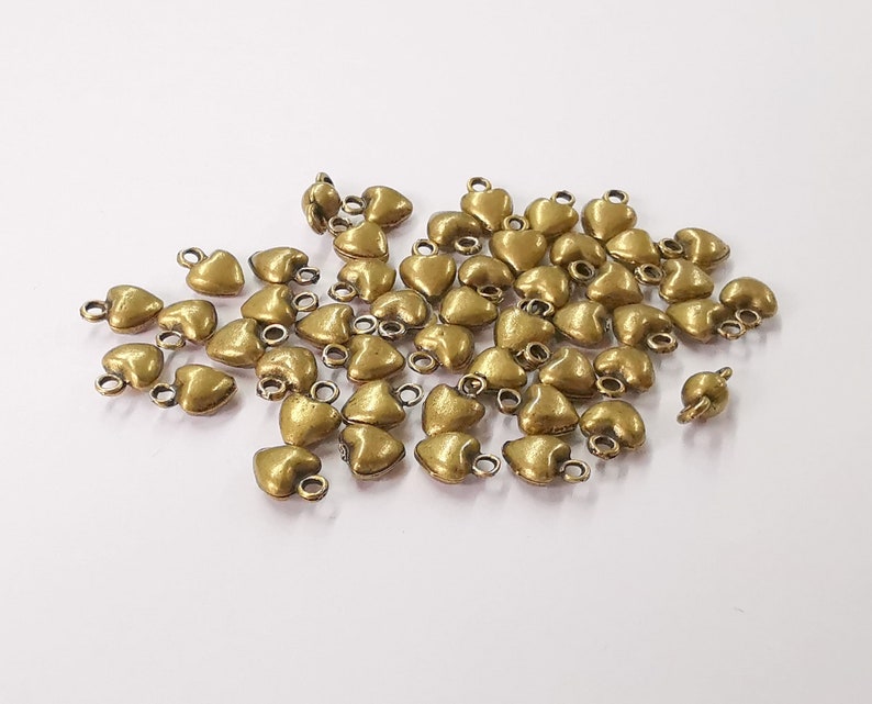 20 Heart charms Antique bronze plated charms (9x7mm) G24558