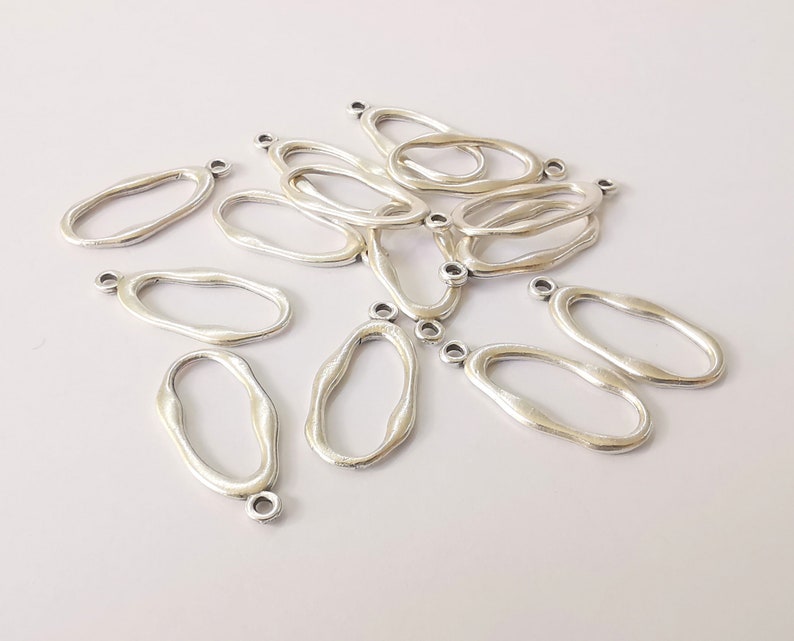 10 Oval charms Antique silver plated charms (25x12mm) G24609