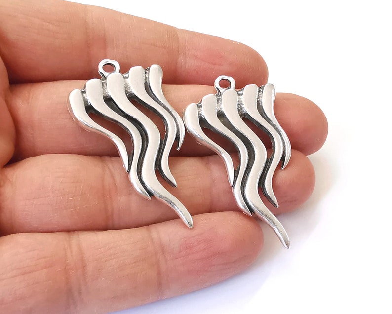 2 Silver charms Antique silver plated charms (47x26mm) G24934