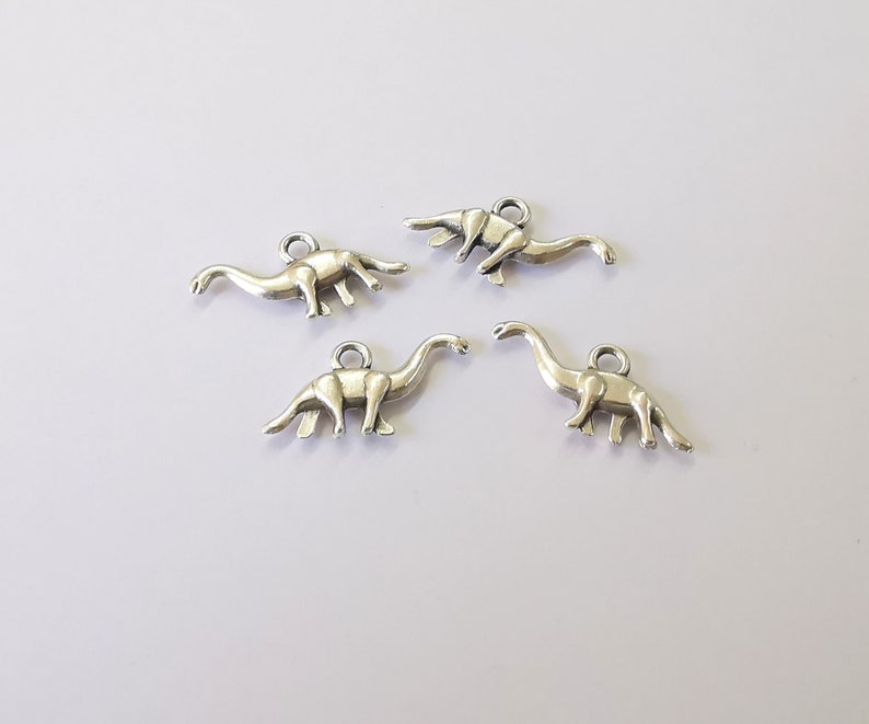 10 Dinosaur Charm Antique Silver Plated Charms (26x12mm) G24948