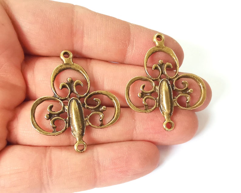 2 Antique bronze connector charms Antique bronze plated charms (42x35mm) G24815