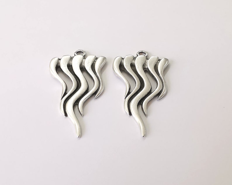 2 Silver charms Antique silver plated charms (47x26mm) G24934