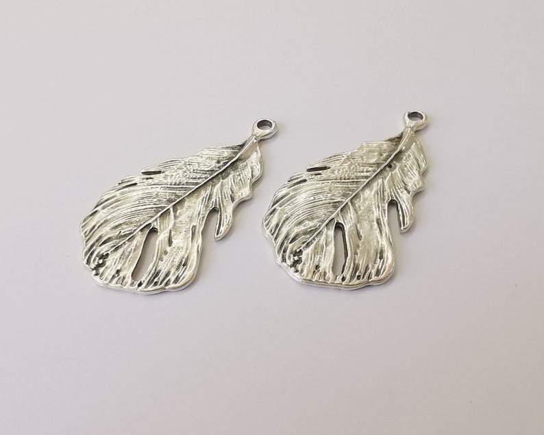 2 Feather charms Antique silver plated charms Double sided (47x25mm) G24939