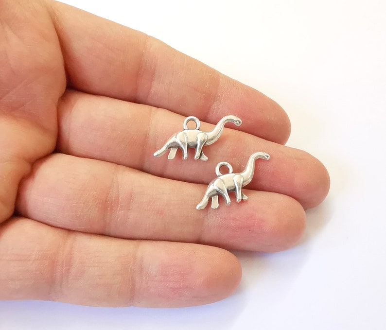 10 Dinosaur Charm Antique Silver Plated Charms (26x12mm) G24948