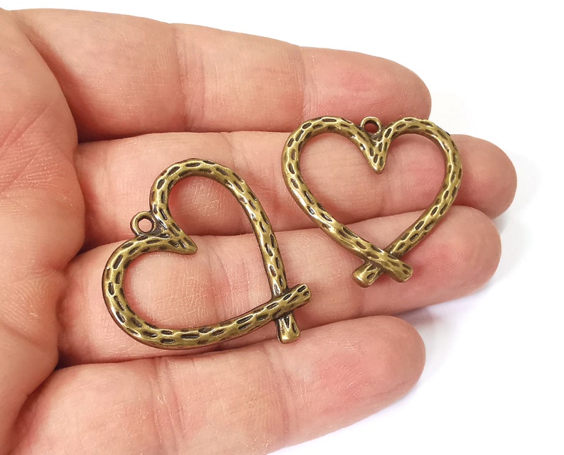 2 Heart charms Antique bronze plated charms (33x32mm) G25111