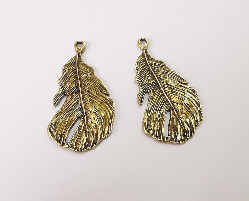 2 Feather charms Antique bronze plated charms Double sided (47x25mm) G25118